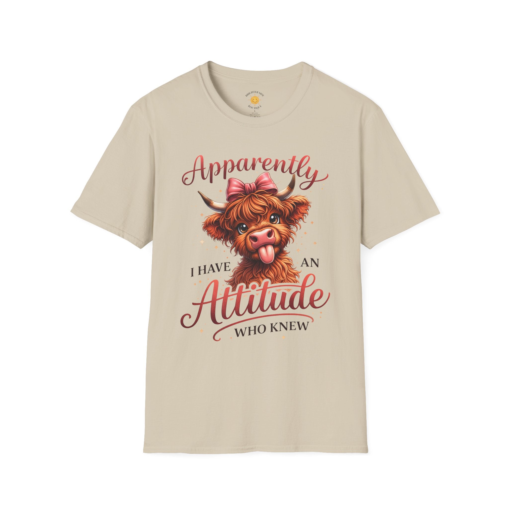 Cute Highland cow with pink bow sticking out its tongue and the phrase "Apparently I Have An Attitude Who Knew" in decorative script lettering.