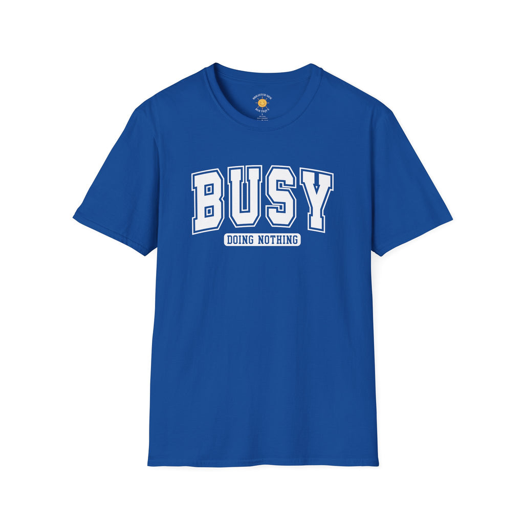 Bold varsity typography design featuring the phrase "Busy Doing Nothing" in white collegiate-style lettering on a dark background.