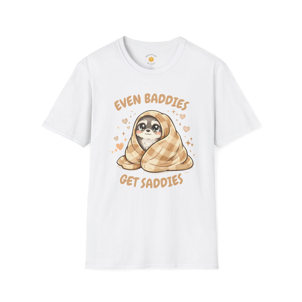 Cute raccoon wrapped in a plaid blanket with hearts and stars and the phrase "Even Baddies Get Saddies."