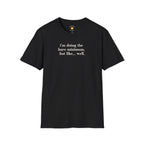 Typography t-shirt design reading "i'm doing the bare minimum. but like... well." in bold cream vintage serif lettering.